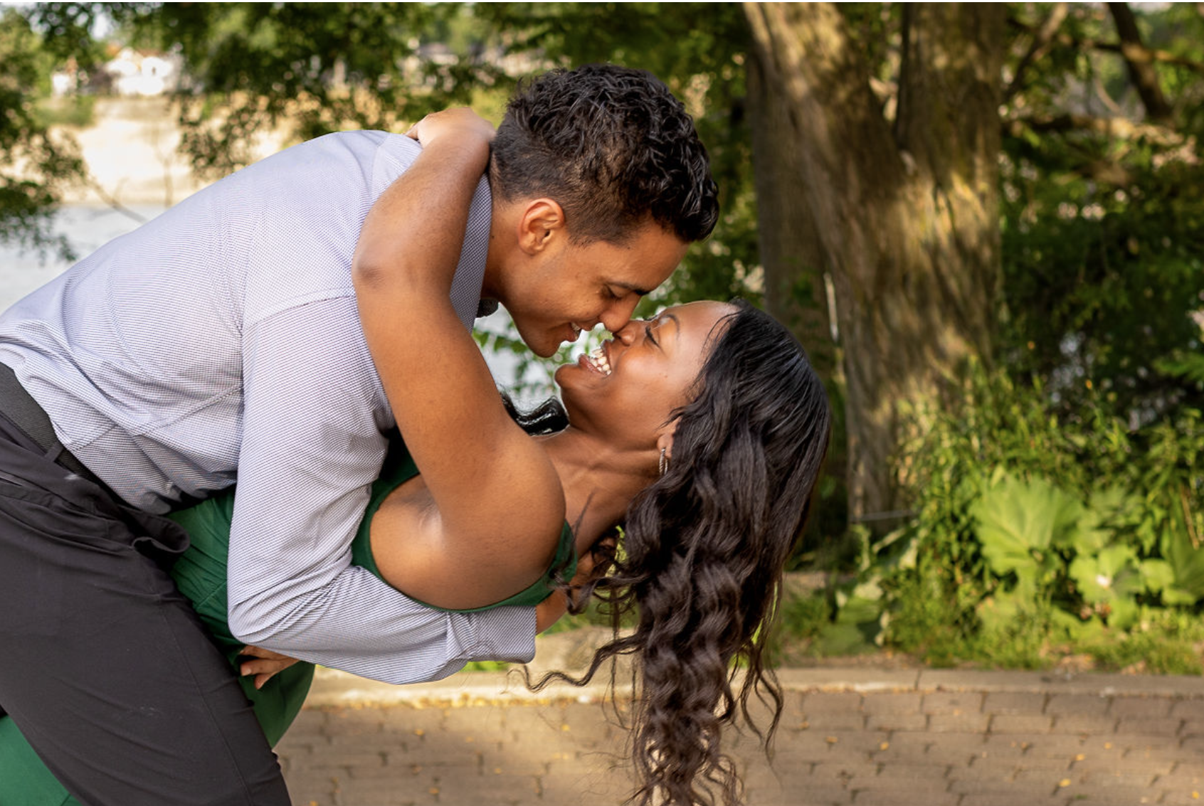 Jacob and Alaura smiling at each other, engagement ring on her hand